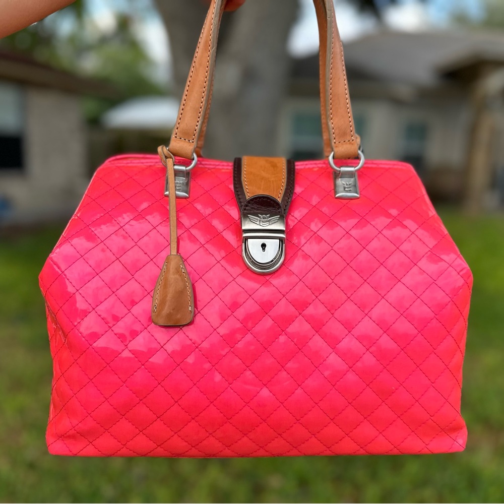 New pink consuela bag never been used.